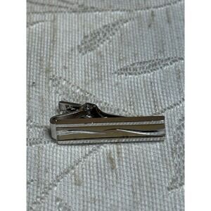 Vintage Anson silver and gold tone tie clip with a modernist swooping design